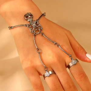 Gothic skull hand harness in gunmetal finish featuring detailed ribcage and bone design