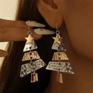 Detail of Christmas tree long drop earrings in gold and silver mixed metal finish