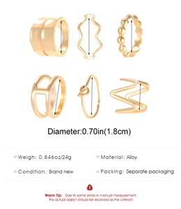 Detail von 6-teiligem goldenem Ring-Set mit Innendurchmesser-Maßen und Wellendesigns