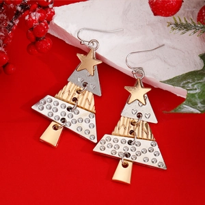 Close-up of mixed-metal Christmas tree earrings with star and heart details
