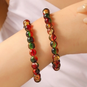 Exquise handgemaakte kralenarmbanden in kerstkleuren met goudfolie accenten voor dames