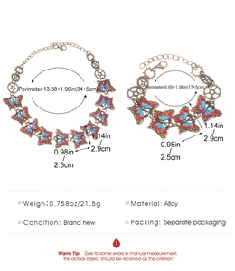 Detail view of steampunk butterfly necklace and bracelet set with industrial gears