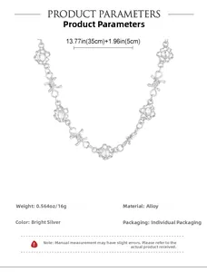 Detail view of silver punk choker chain with thorn links and pendant size measurements