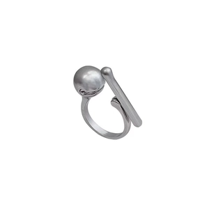 Minimalist silver kinetic ring with geometric spherical and cylindrical stress relief design