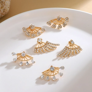 Vintage gold-plated fan-shaped drop earrings with zircon heart and wing motifs