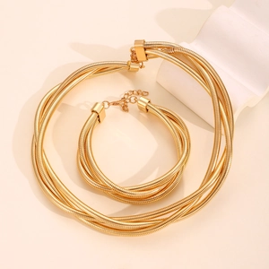 Elegant gold multi-strand spring collar necklace and matching bracelet set for women