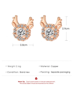 Detailed view of rose gold reindeer antler stud earrings with sparkling round main stones