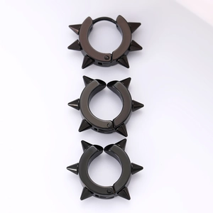 Three punk style black stainless steel hoop earrings with sharp spikes in vertical row