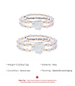 Detail showing two double-layer pearl camellia anklets with dimensions and weight data