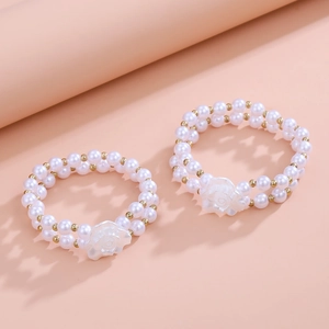 Double-layered pearl camellia anklet set with white roses and golden metal beads