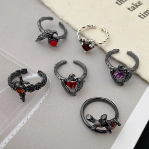 Punk gothic style 6-piece adjustable ring set featuring red gems and raven designs