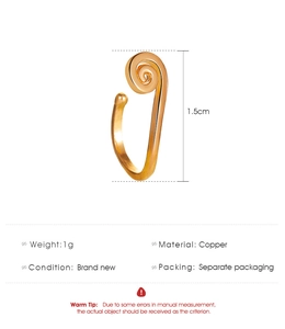 Detailed view of adjustable golden spiral ear cuff with 1.5cm dimension measurement