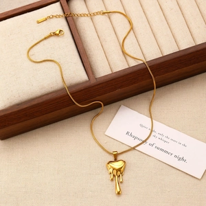 Golden stainless steel lava heart necklace on snake chain with lobster clasp and extender