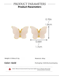 Detailed size specifications of gold butterfly stud earrings with crystal accents
