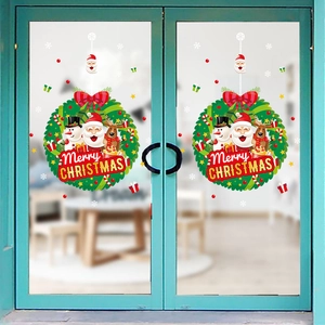 Christmas wreath window stickers with Santa, snowman and reindeer for holiday decoration