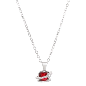 Exquisite ruby red heart pendant necklace with shimmering crystal planet ring on silver chain