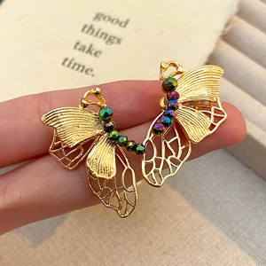 Hollow butterfly earrings with gold metal frame and colorful crystal accents