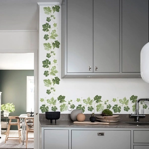 Modern kitchen wall decor featuring green grape leaf vine self-adhesive PVC wall stickers