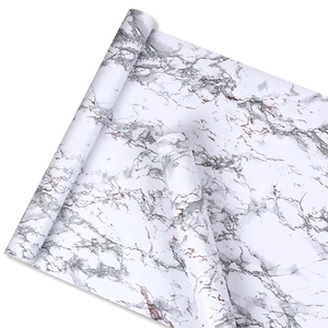 Detail of white marble self-adhesive wallpaper with natural grey and lavender textures