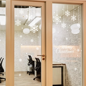 White snowflake static window clings with Merry Christmas text for festive glass decor