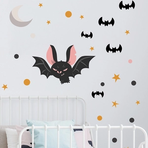 Cartoon Halloween wall sticker set featuring bats, moon and stars in children's bedroom