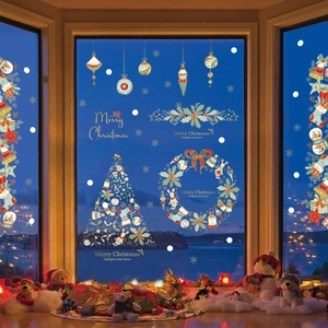 Christmas window stickers set with festive gold and blue holiday patterns on glass