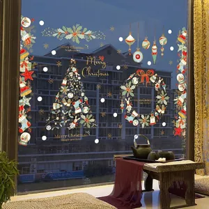 Christmas window decals with festive trees, snowflakes and wreaths on glass surfaces