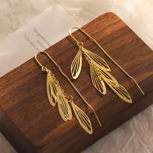 Elegant gold hollow leaf tassel long threader earrings with detailed craft for women