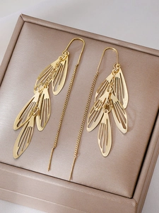 Detailed close-up of golden tassel leaf earrings with S925 sterling silver hallmarks