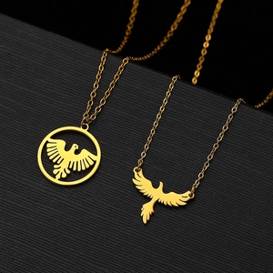 Men's hip hop gold eagle pendants on stainless steel chains over a black gift box