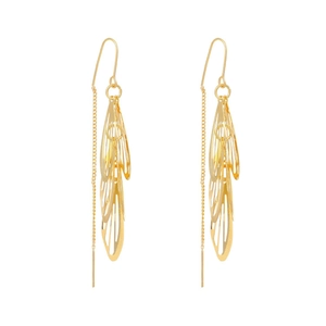 Golden tassel leaf earrings featuring hollowed metal foliage and long chain fringe