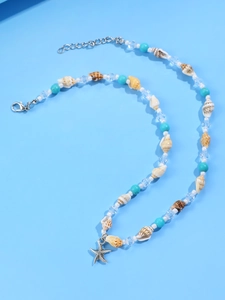 Detailed view of the starfish pendant with assorted ocean shells and colorful beads