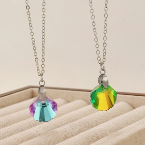 Faceted crystal shell pendant necklace in blue and yellow gradients on silver chain