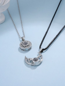 Detail of sun and moon magnetic couple necklaces with projection stones and micro-inlays