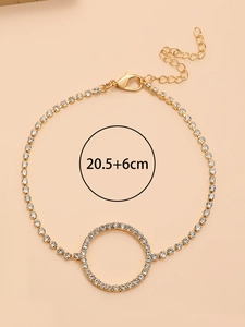 Détail de la chevillère dorée en strass avec fermoir mousqueton et marquage 20,5+6cm