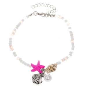 Detail of bohemian starfish shell and conch beads anklet with lobster clasp and chain