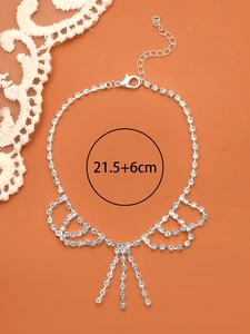 Bracelet de cheville argenté avec strass, pampilles et indication de taille 21,5+6cm