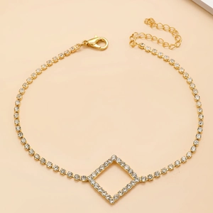 Bracelet de cheville doré géométrique avec strass scintillants et pendentif goutte d'eau