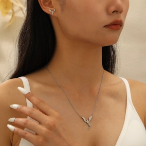 Fashionable stainless steel flying dragon pendant necklace and earrings set for women