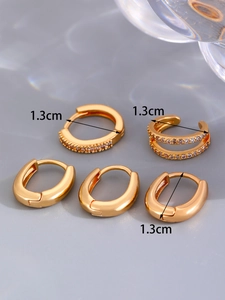 Detail showing 5-piece 14K gold hoop earrings set with zircon stones and 1.3cm size markings
