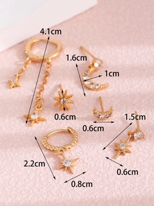 Detailed macro view of 14K gold plated celestial earrings set with sparkling zircon stones