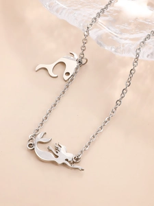 Detailed close-up of stainless steel mermaid pendant necklace with elegant O-chain link