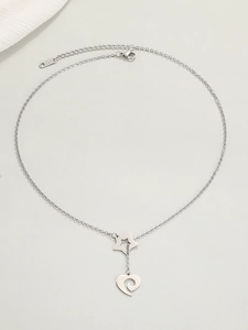 Detail of silver stainless steel necklace with hollow star and swirl heart pendants