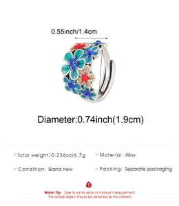 Detail showing dimensions of silver flower ring with colorful enamel and alloy specs
