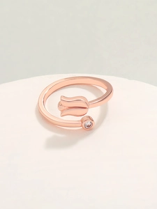 Detailed view of rose gold tulip ring featuring a polished flower bud and zircon stone