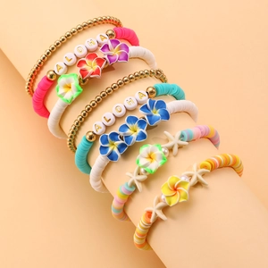Set de pulseras bohemias de cuentas heishi con estrella de mar y letras de ALOHA
