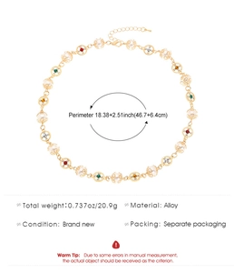 Detailed size measurement of the gold-tone cross necklace set with colorful crystals