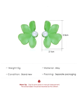 Detail showing green flower earrings with white pearls and exact size measurements