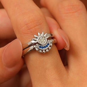 Exquisite sun and moon stacking ring set with sparkling diamonds and blue gemstones