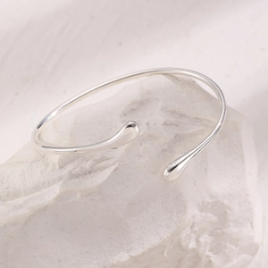 Detailed close-up showing the S925 silver hallmark on a minimalist drop open arm cuff